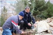همایش کاشت بذر و نهال به یاد درگذشتگان یک سال اخیر در خرم آباد برگزار شد+ تصاویر