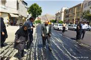 طوفان شهرداری خرم آباد در اجرای نهضت آسفالت از سطح شهر